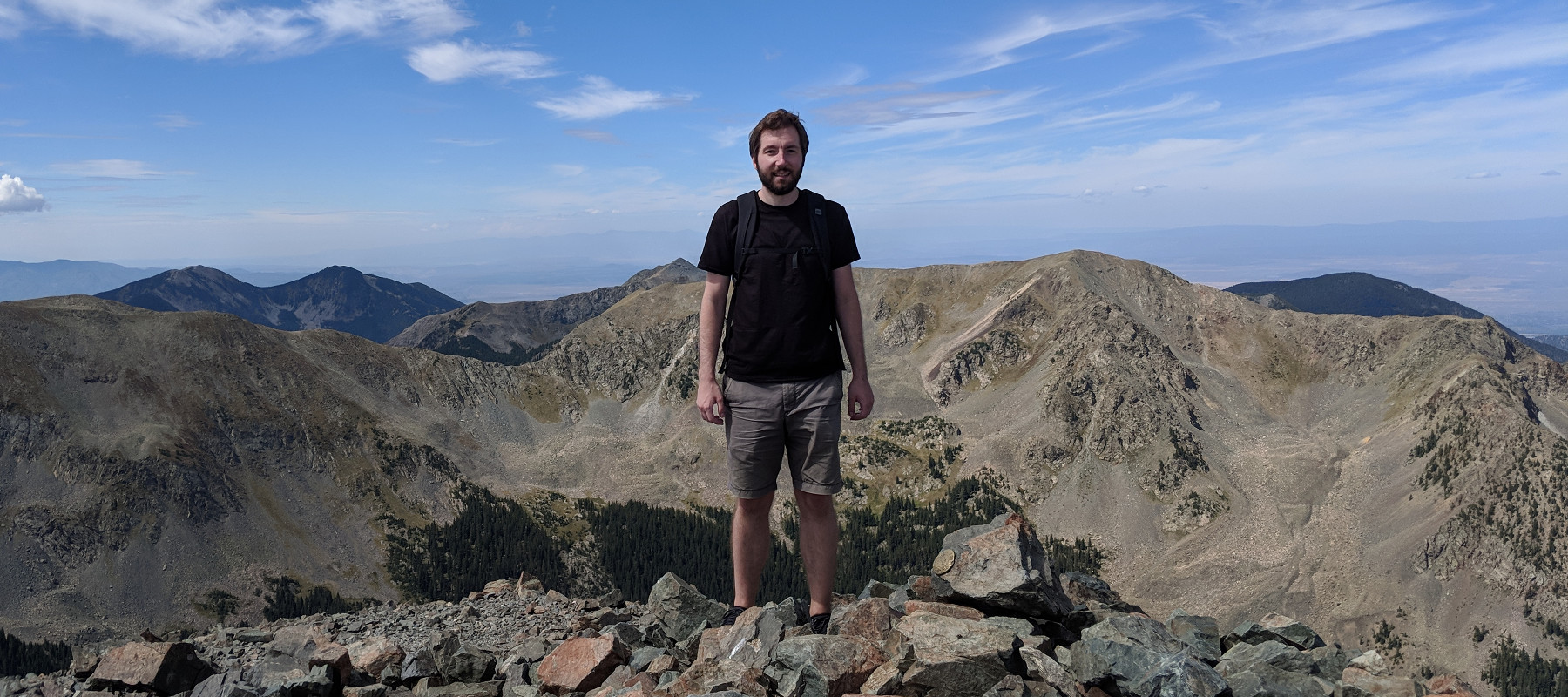 Photo of Jeffrey Knockel atop Wheeler Peak (New Mexico)